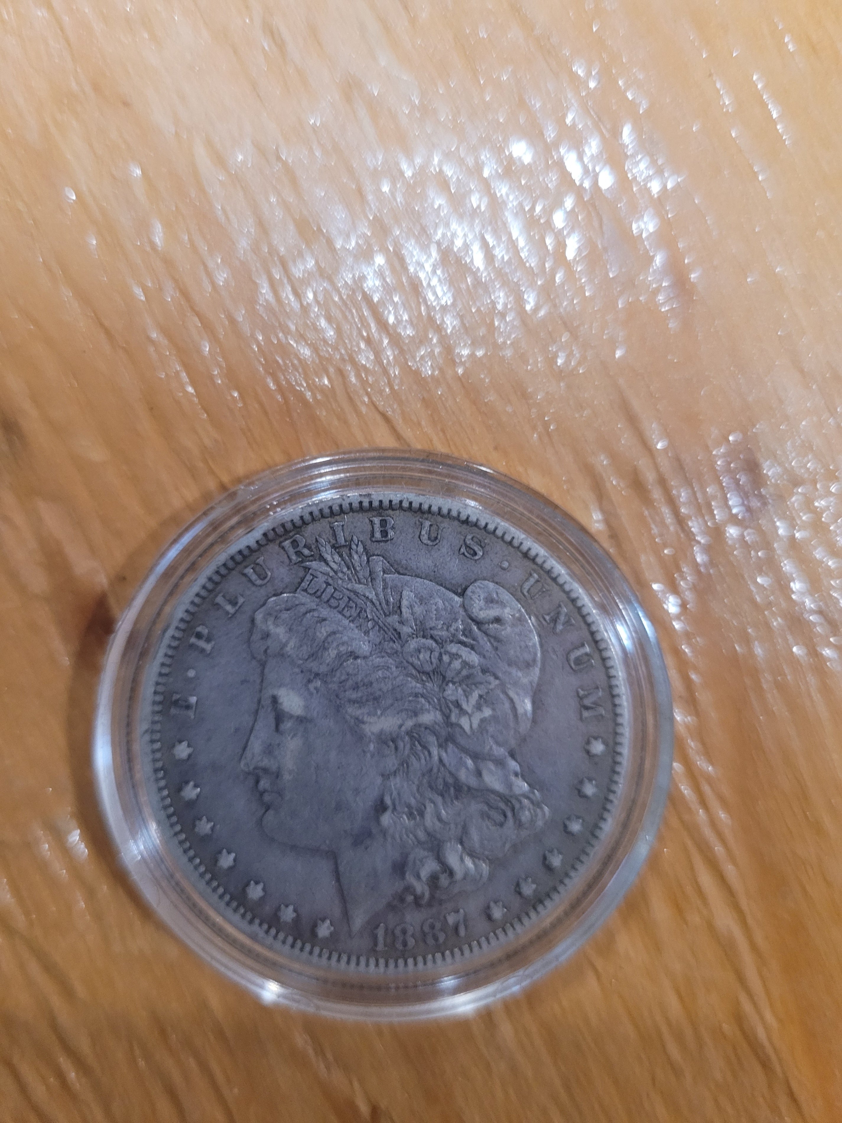 1887 Morgan Silver Dollar – Vintage U.S. Silver Coin in Protective Case - Image 1